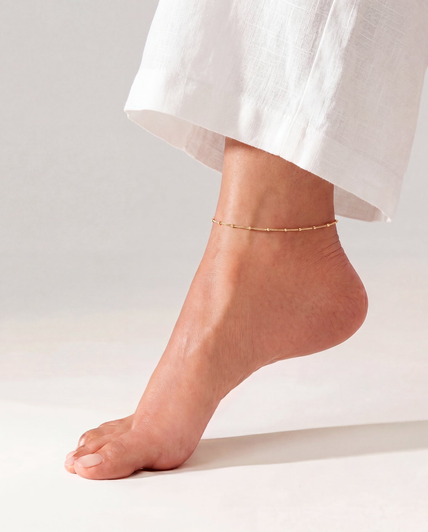 Gold Satellite Anklet • B001