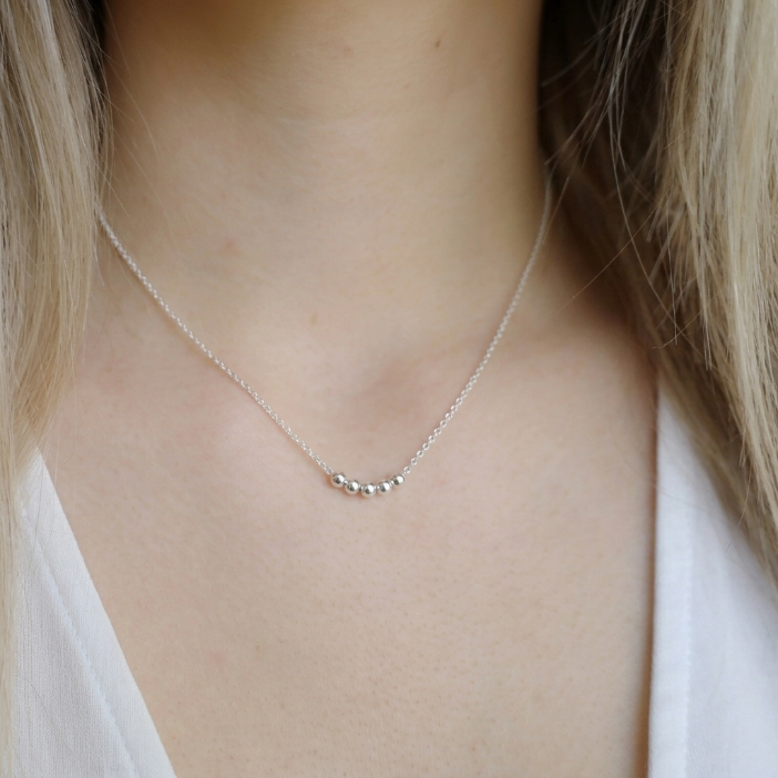 Silver Symbolic Beaded Necklace